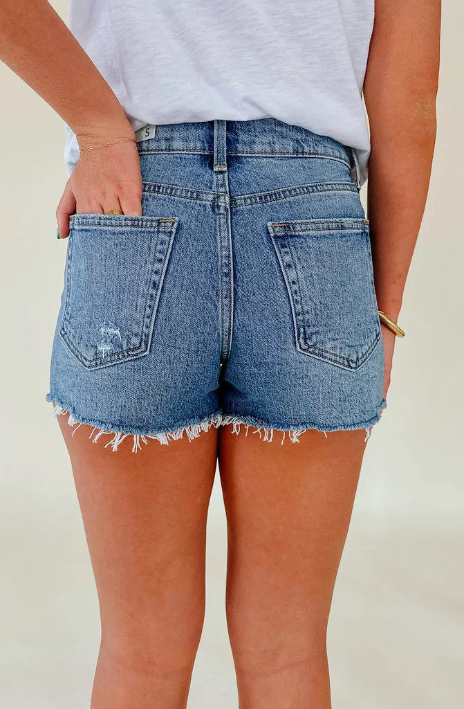 High-waisted distressed denim shorts by Just USA.