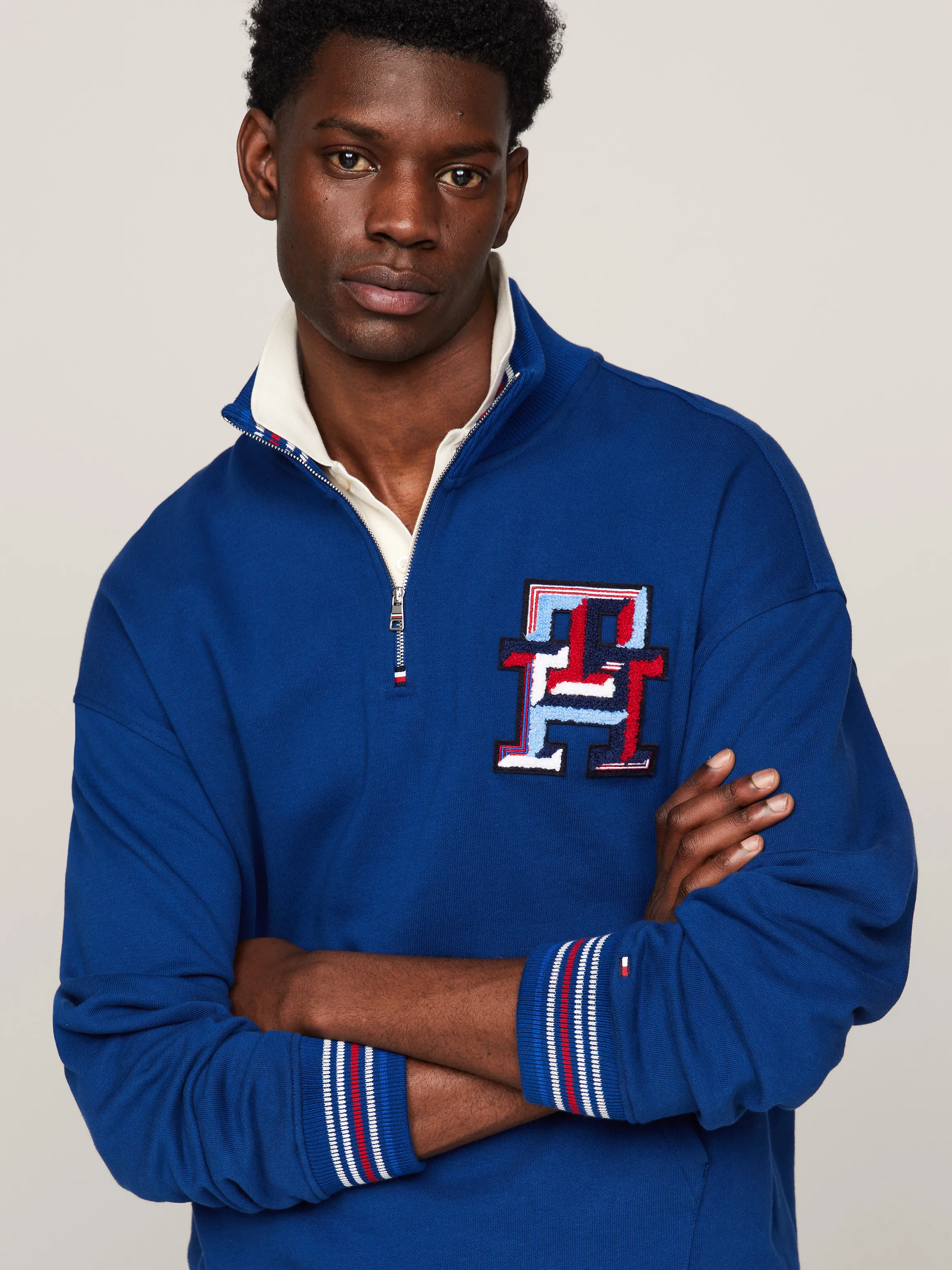 Tommy Hilfiger TH Monogram Quarter-Zip Sweatshirt.