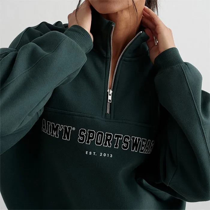 Varsity Sweatshirt Half Zip Hoodie in Deep Emerald Green available at Stirling Sports